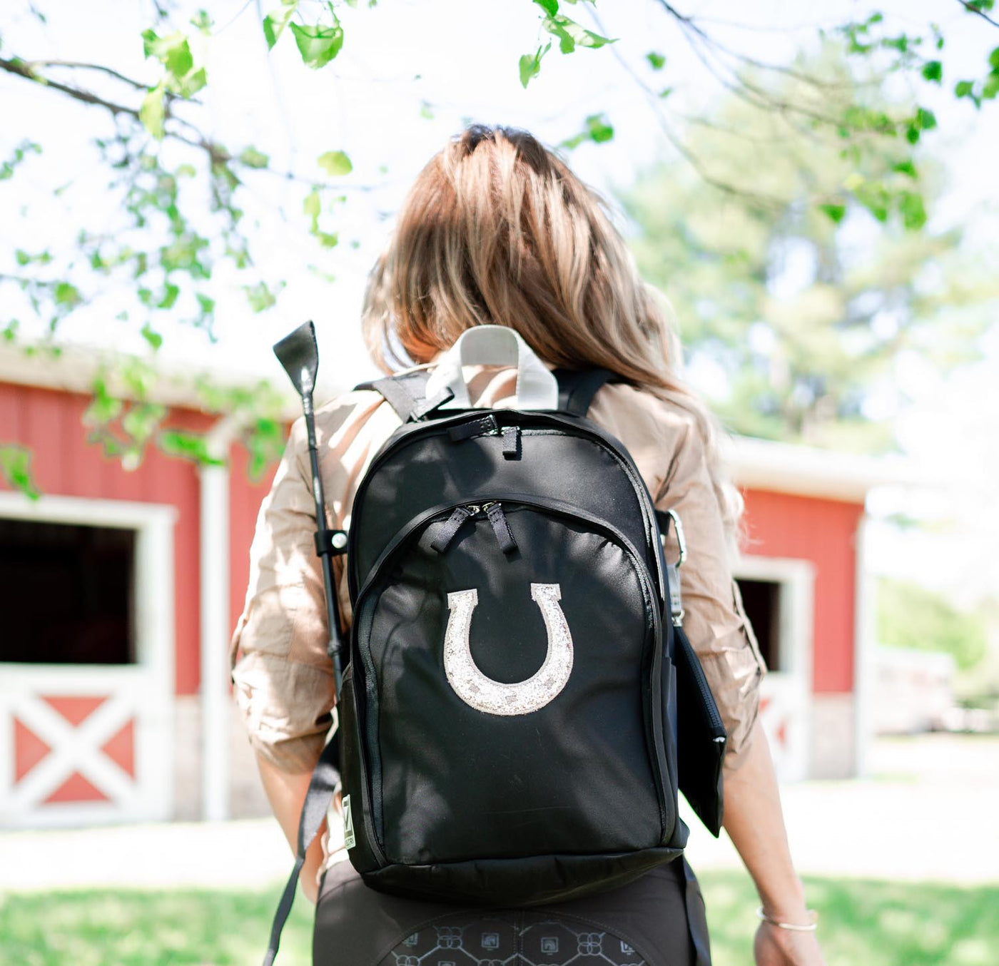 Novelty Delaire Backpack - “Horse Shoe” (custom embroidered - allow an additional 5 business days to ship)